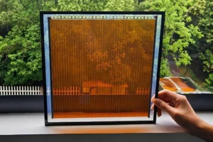 Crean ventanas semitransparentes que generan electricidad con luz solar y artificial